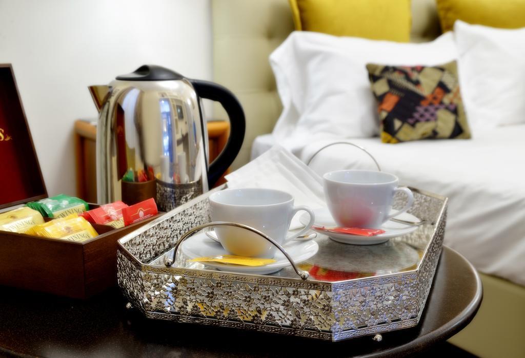 Suites Rome Condotti Экстерьер фото